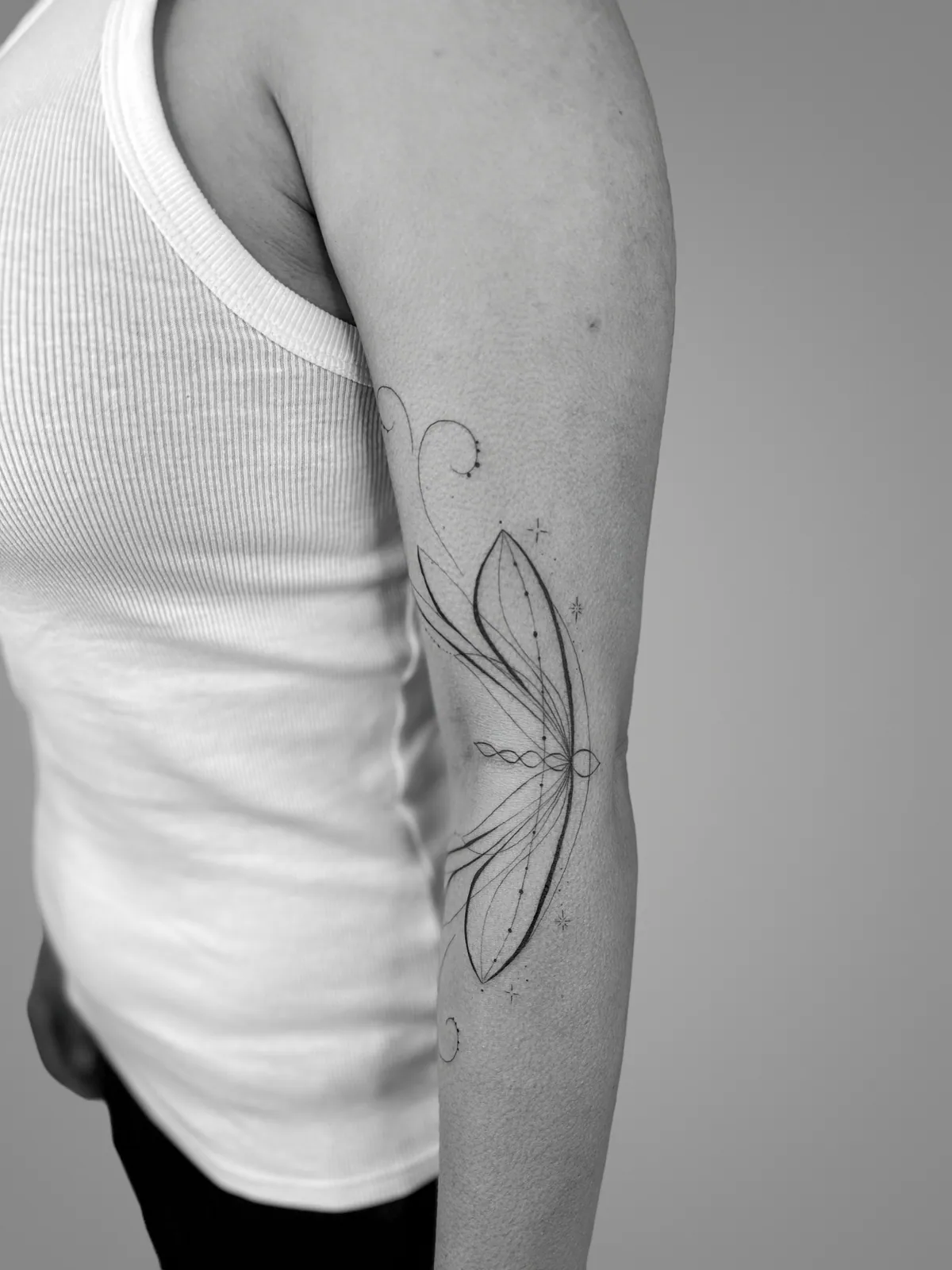 Linework Upper-Arm Butterfly — tattoo view