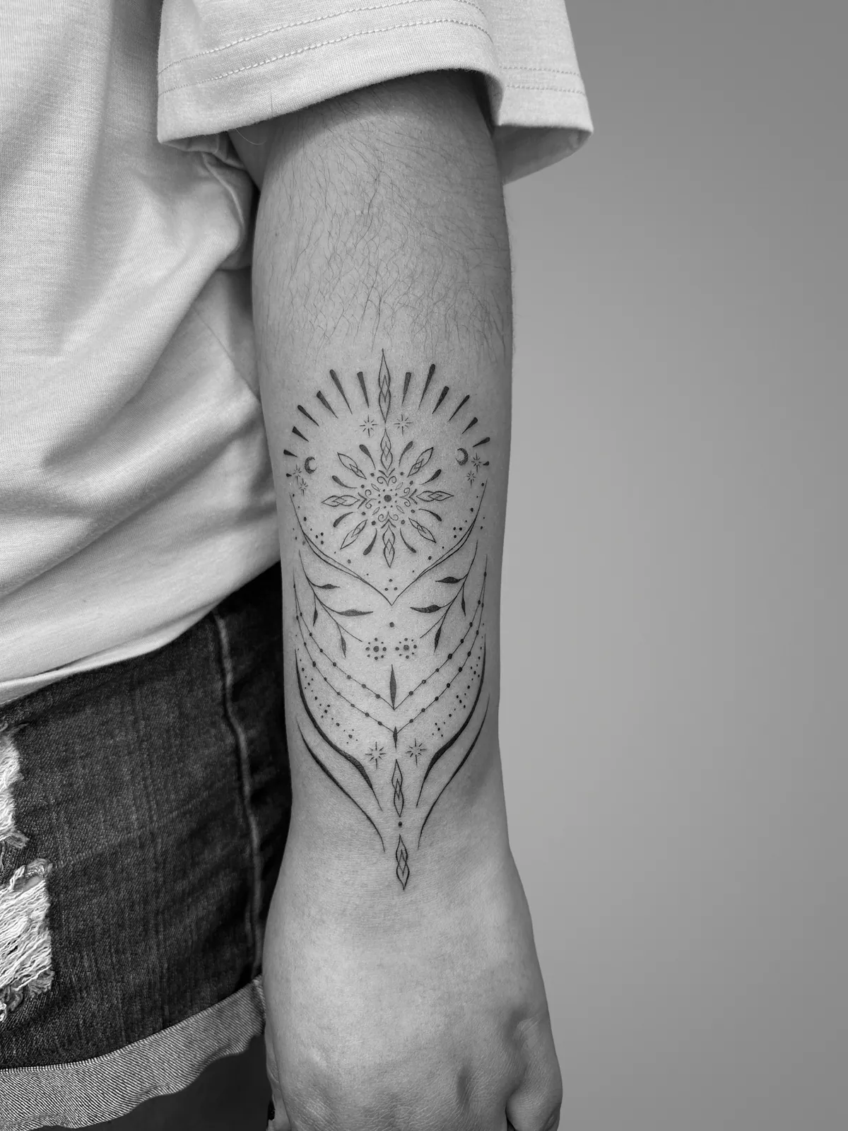 Original ornamental linework on an arm