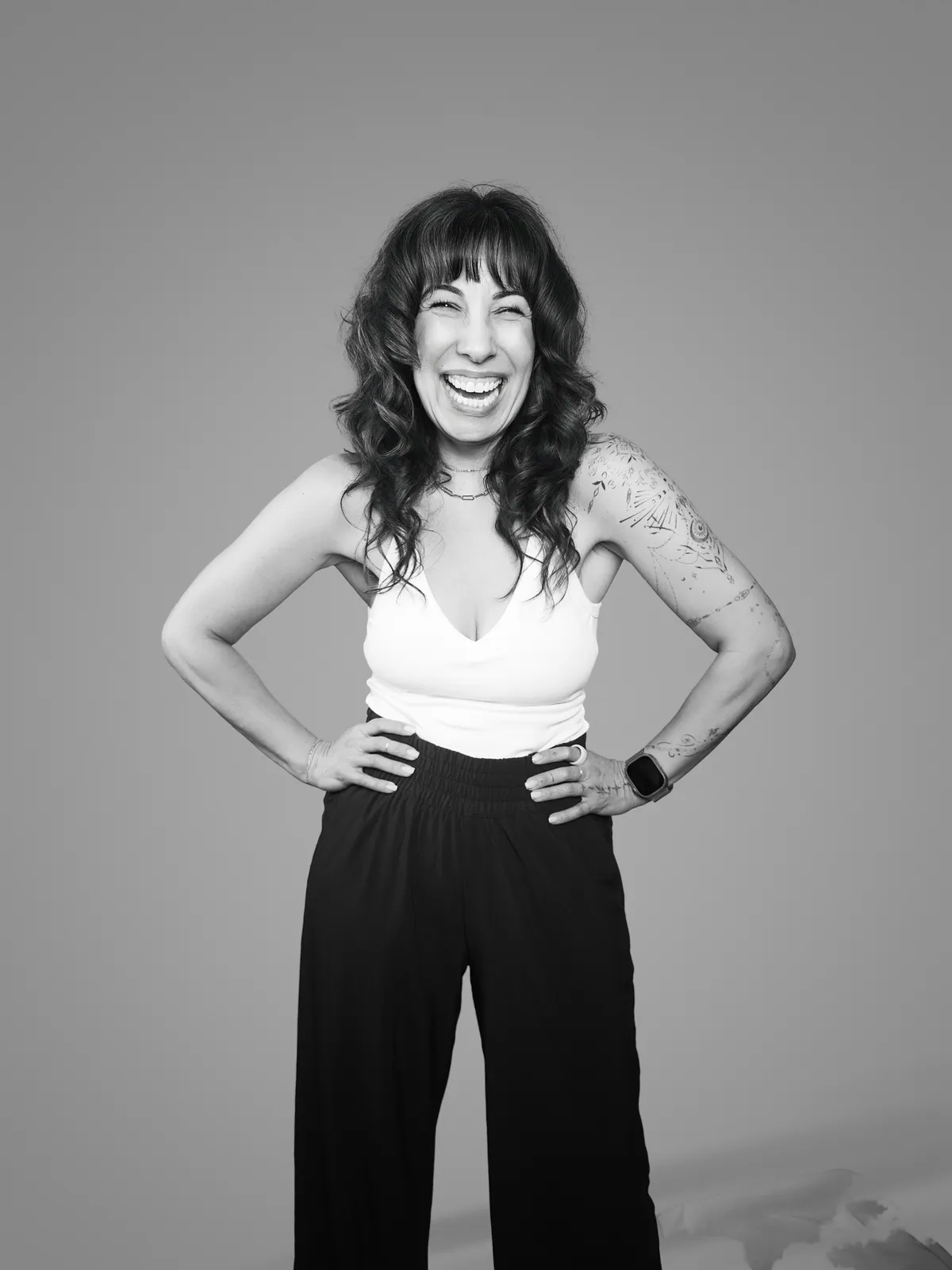 Studio portrait of a woman wearing her tattoos, photograph 6 of 16