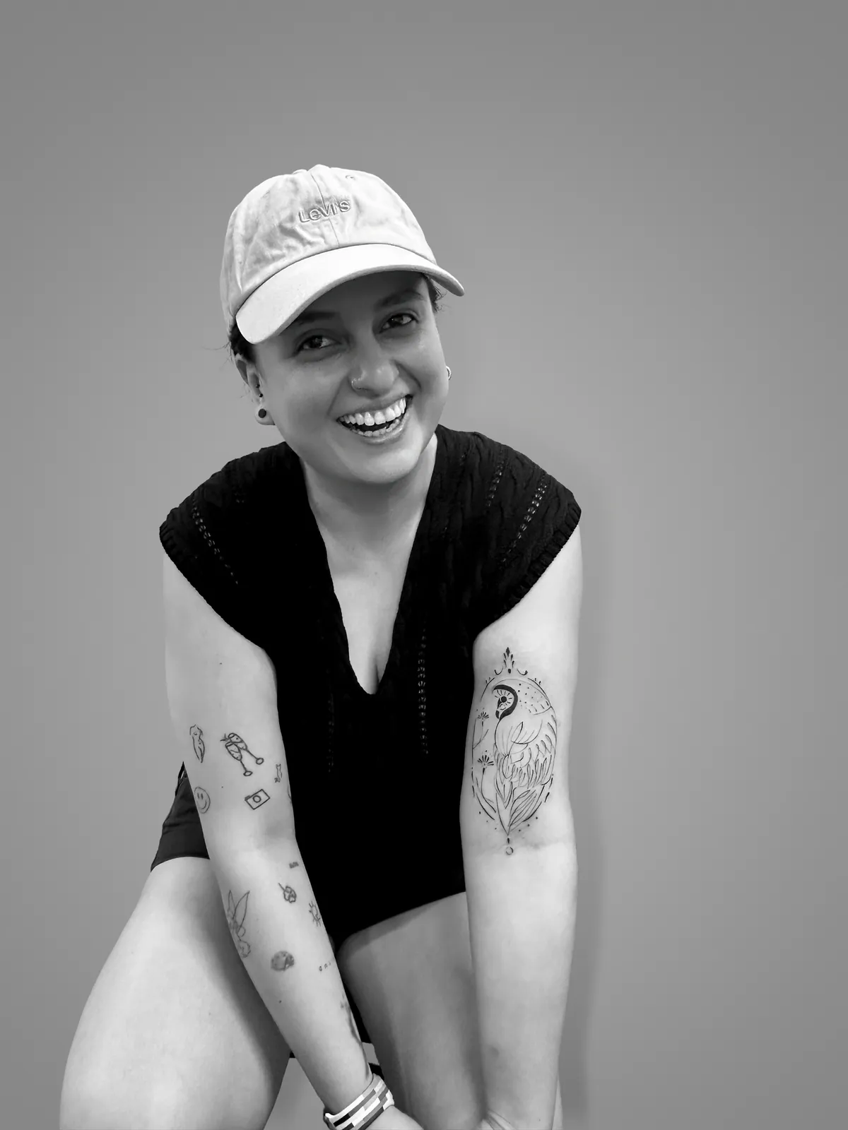 Studio portrait of a woman wearing her tattoos, photograph 10 of 16