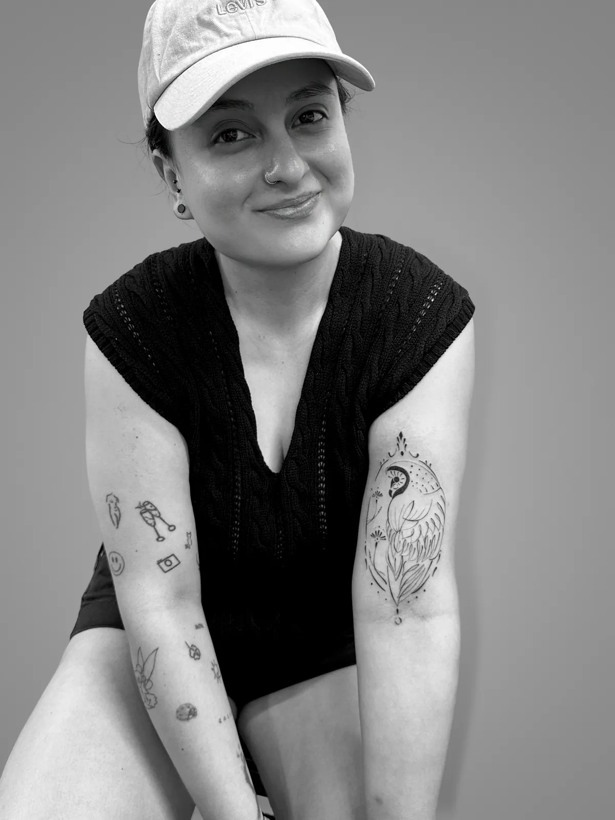 Studio portrait of a woman wearing her tattoos, photograph 9 of 16